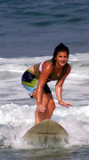 Meghan surfing in the Outer Banks